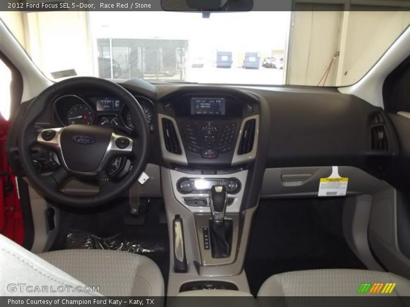 Race Red / Stone 2012 Ford Focus SEL 5-Door