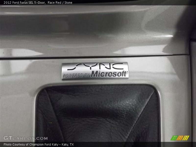 Race Red / Stone 2012 Ford Focus SEL 5-Door