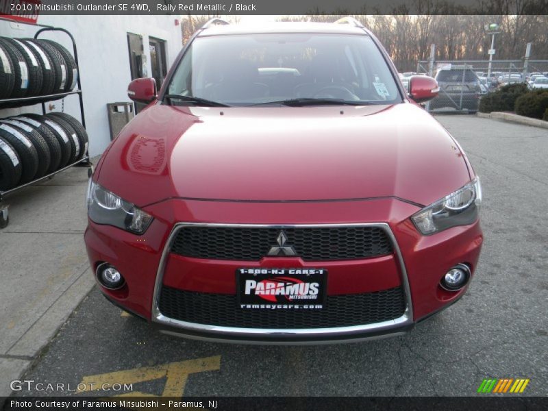 Rally Red Metallic / Black 2010 Mitsubishi Outlander SE 4WD