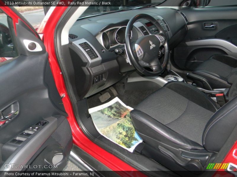 Rally Red Metallic / Black 2010 Mitsubishi Outlander SE 4WD