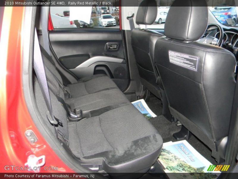 Rally Red Metallic / Black 2010 Mitsubishi Outlander SE 4WD