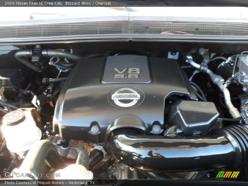 Blizzard White / Charcoal 2009 Nissan Titan SE Crew Cab