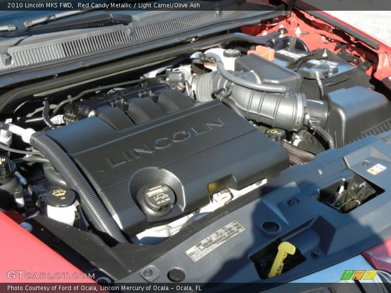 Red Candy Metallic / Light Camel/Olive Ash 2010 Lincoln MKS FWD