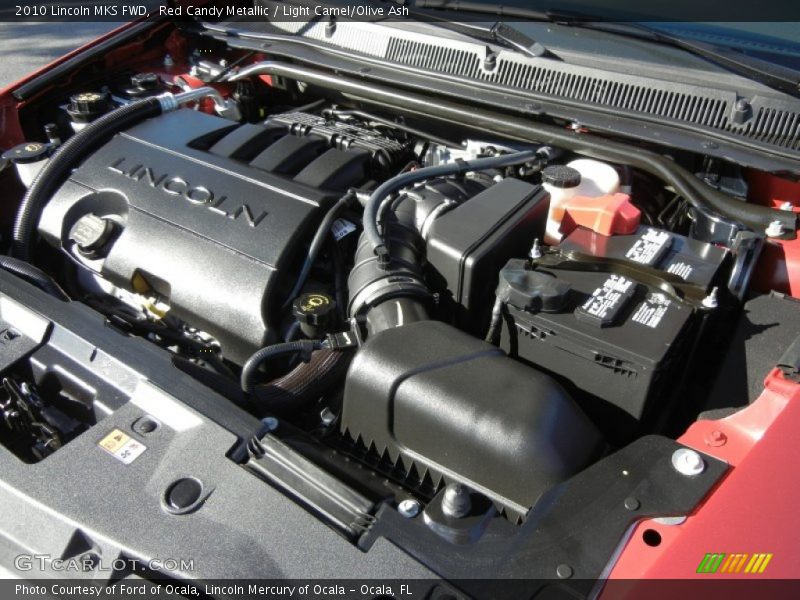 Red Candy Metallic / Light Camel/Olive Ash 2010 Lincoln MKS FWD
