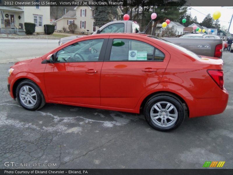 Victory Red / Jet Black/Dark Titanium 2012 Chevrolet Sonic LS Sedan
