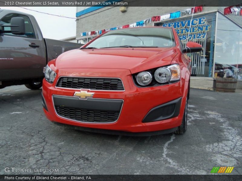 Victory Red / Jet Black/Dark Titanium 2012 Chevrolet Sonic LS Sedan