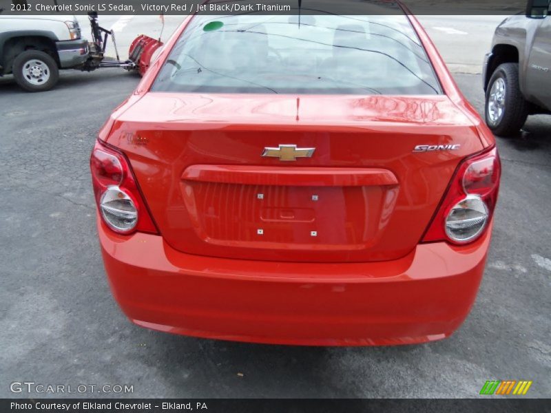 Victory Red / Jet Black/Dark Titanium 2012 Chevrolet Sonic LS Sedan