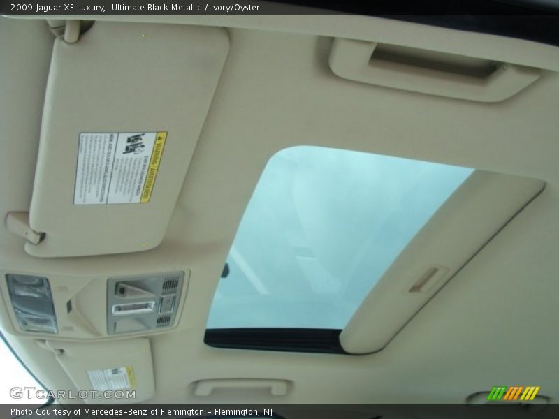 Ultimate Black Metallic / Ivory/Oyster 2009 Jaguar XF Luxury