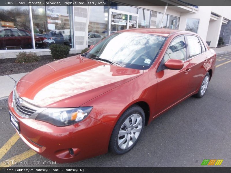 Paprika Red Pearl / Ivory 2009 Subaru Impreza 2.5i Sedan