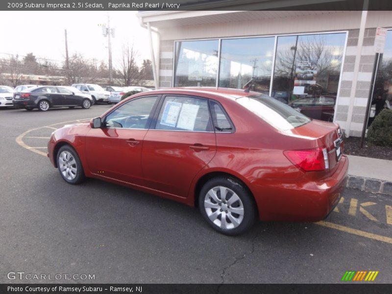 Paprika Red Pearl / Ivory 2009 Subaru Impreza 2.5i Sedan