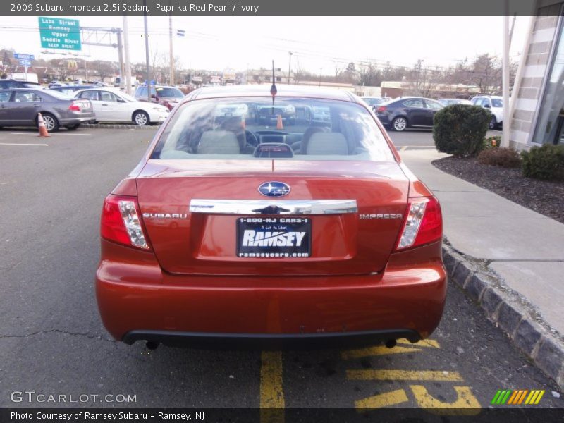 Paprika Red Pearl / Ivory 2009 Subaru Impreza 2.5i Sedan