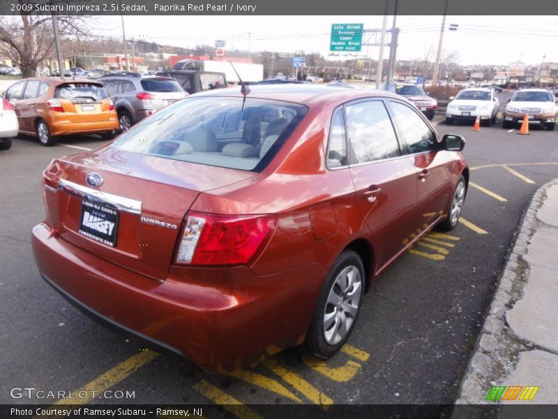 Paprika Red Pearl / Ivory 2009 Subaru Impreza 2.5i Sedan