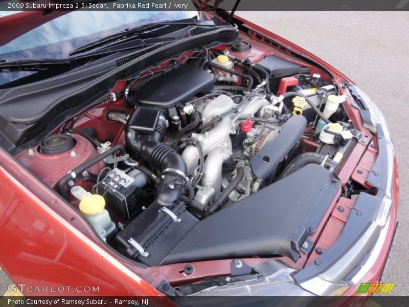 Paprika Red Pearl / Ivory 2009 Subaru Impreza 2.5i Sedan