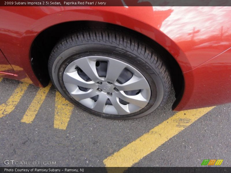 Paprika Red Pearl / Ivory 2009 Subaru Impreza 2.5i Sedan