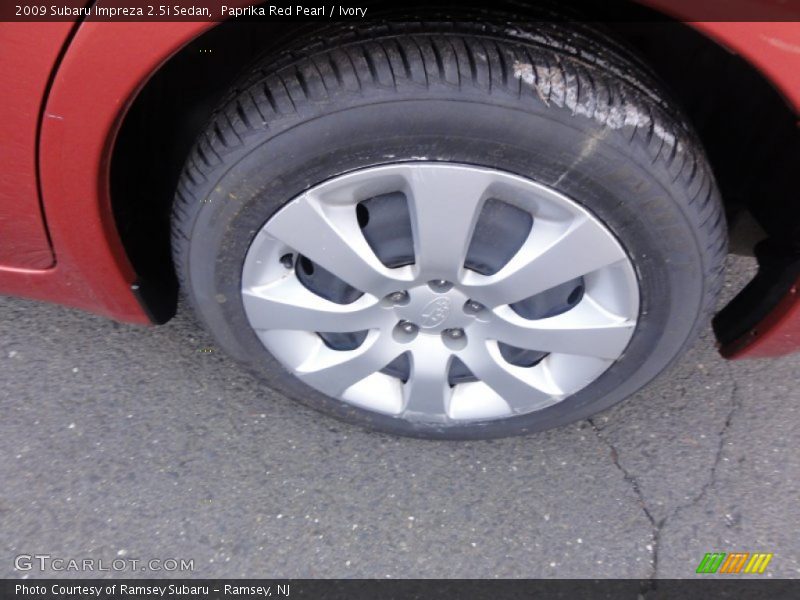 Paprika Red Pearl / Ivory 2009 Subaru Impreza 2.5i Sedan