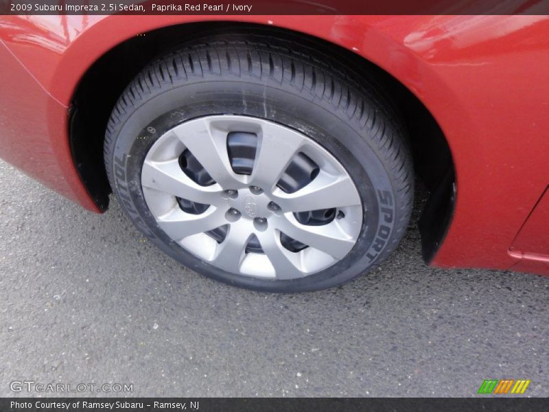 Paprika Red Pearl / Ivory 2009 Subaru Impreza 2.5i Sedan