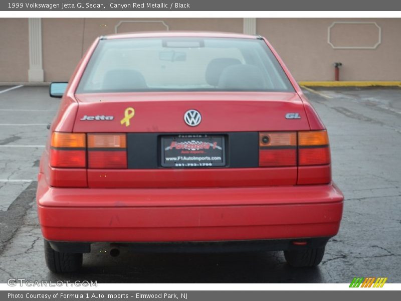 Canyon Red Metallic / Black 1999 Volkswagen Jetta GL Sedan