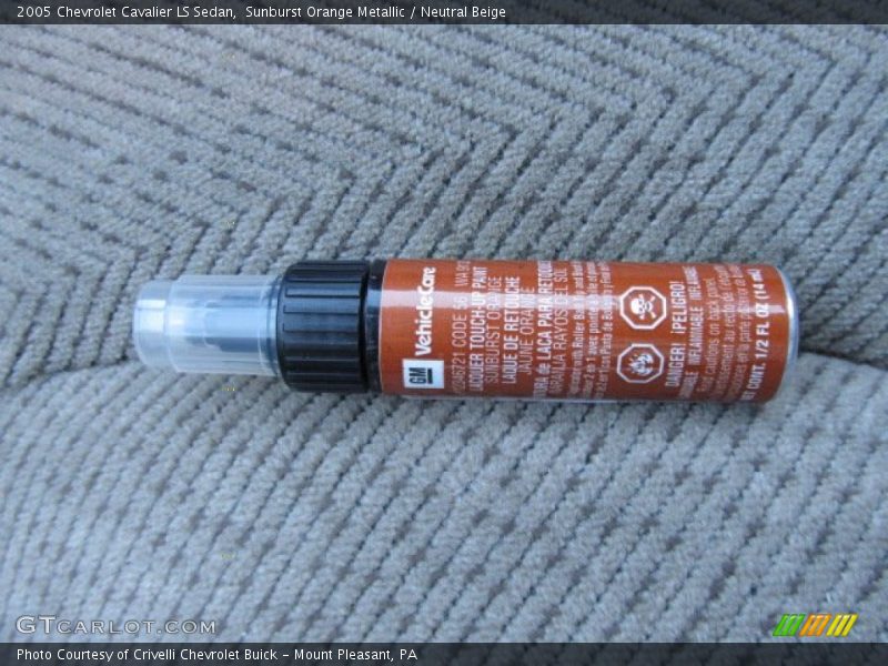 Sunburst Orange Metallic / Neutral Beige 2005 Chevrolet Cavalier LS Sedan