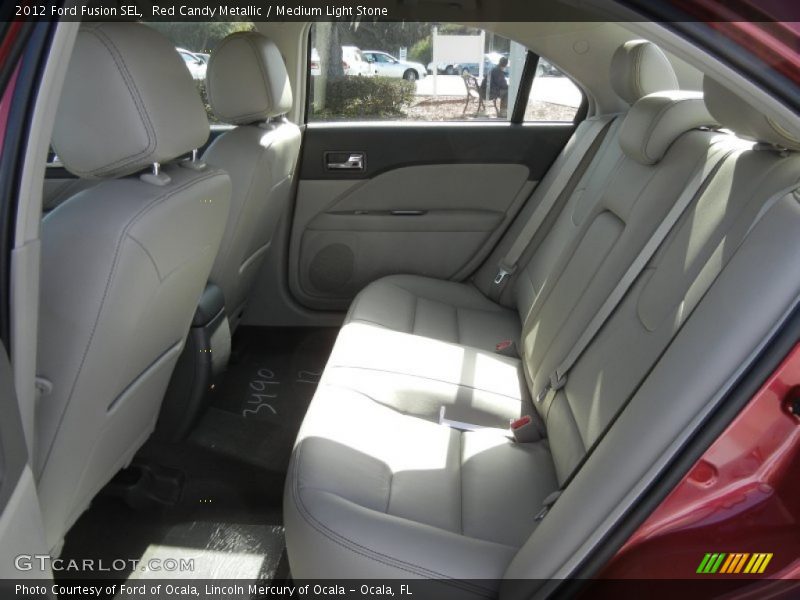 Red Candy Metallic / Medium Light Stone 2012 Ford Fusion SEL