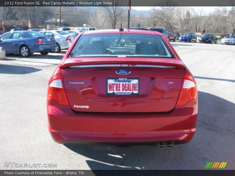 Red Candy Metallic / Medium Light Stone 2012 Ford Fusion SE