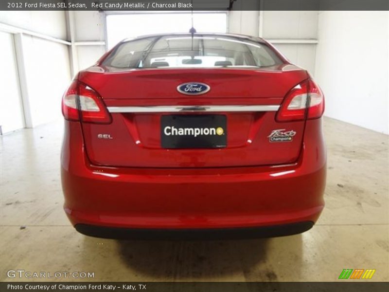 Red Candy Metallic / Charcoal Black 2012 Ford Fiesta SEL Sedan