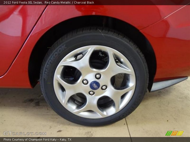 Red Candy Metallic / Charcoal Black 2012 Ford Fiesta SEL Sedan