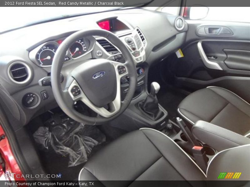 Red Candy Metallic / Charcoal Black 2012 Ford Fiesta SEL Sedan