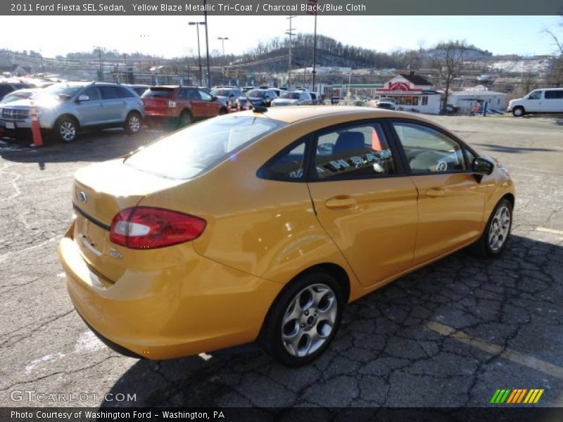 Yellow Blaze Metallic Tri-Coat / Charcoal Black/Blue Cloth 2011 Ford Fiesta SEL Sedan