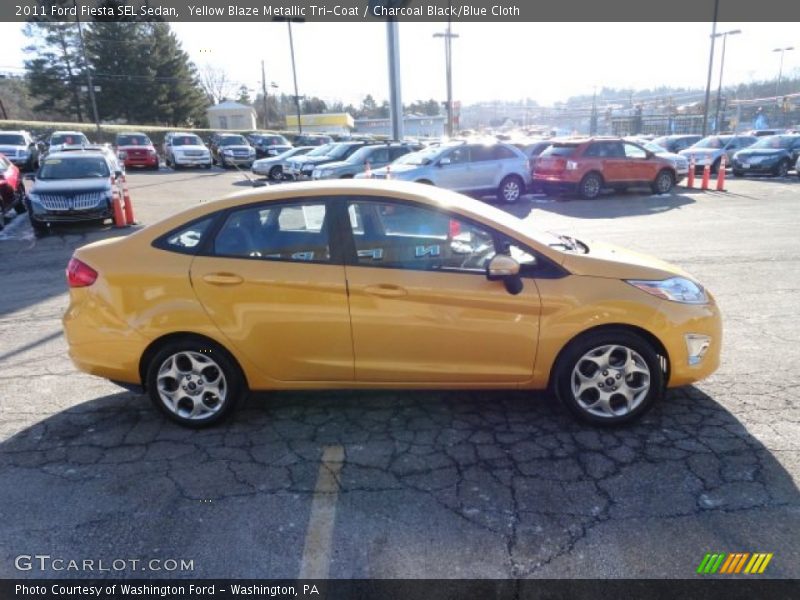 Yellow Blaze Metallic Tri-Coat / Charcoal Black/Blue Cloth 2011 Ford Fiesta SEL Sedan