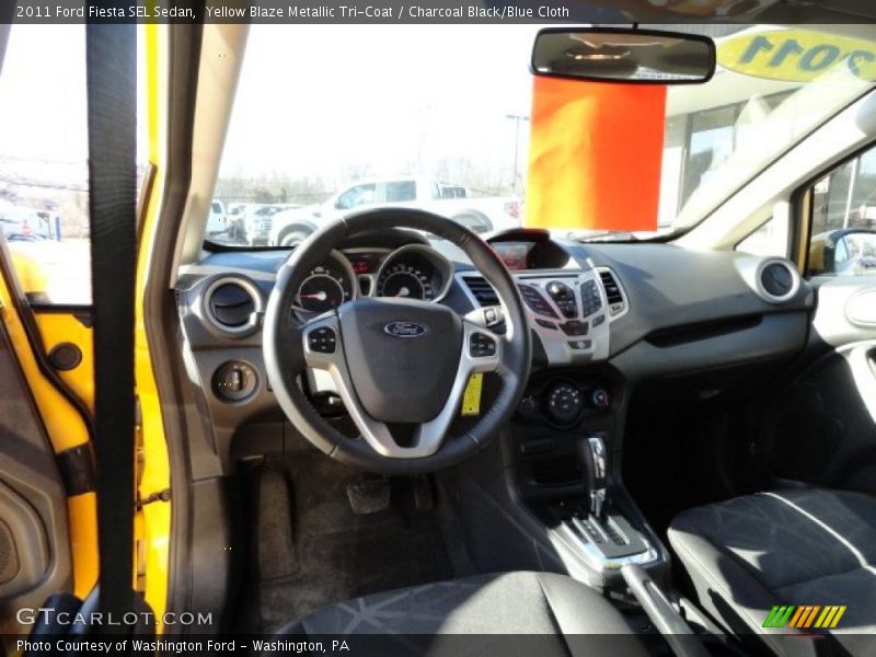 Yellow Blaze Metallic Tri-Coat / Charcoal Black/Blue Cloth 2011 Ford Fiesta SEL Sedan