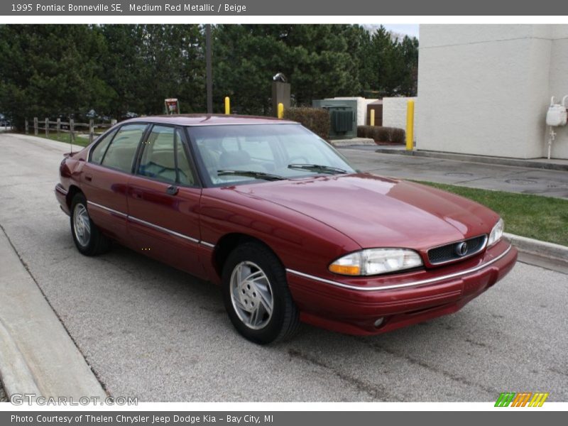 Medium Red Metallic / Beige 1995 Pontiac Bonneville SE