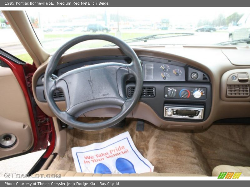 Medium Red Metallic / Beige 1995 Pontiac Bonneville SE