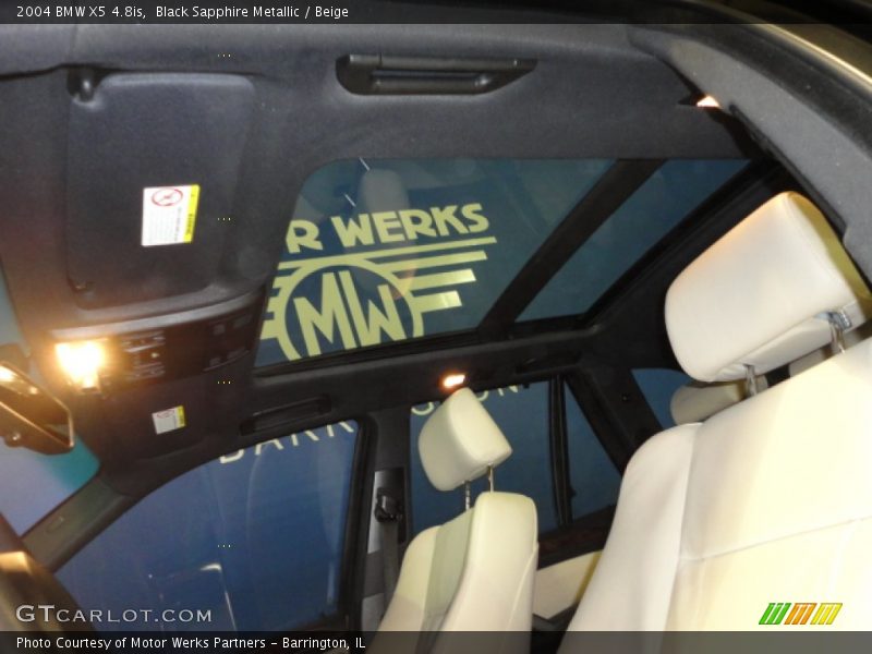 Black Sapphire Metallic / Beige 2004 BMW X5 4.8is