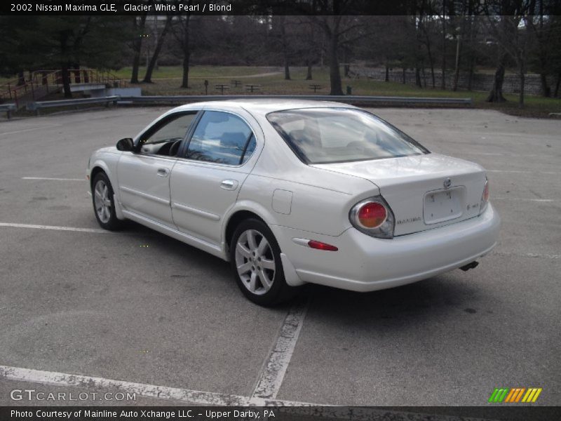 Glacier White Pearl / Blond 2002 Nissan Maxima GLE