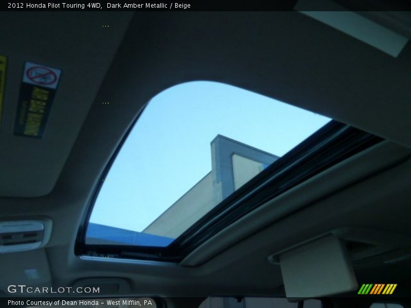Dark Amber Metallic / Beige 2012 Honda Pilot Touring 4WD