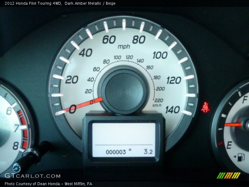 Dark Amber Metallic / Beige 2012 Honda Pilot Touring 4WD