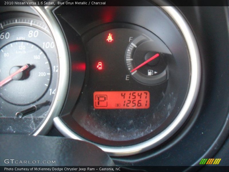 Blue Onyx Metallic / Charcoal 2010 Nissan Versa 1.6 Sedan