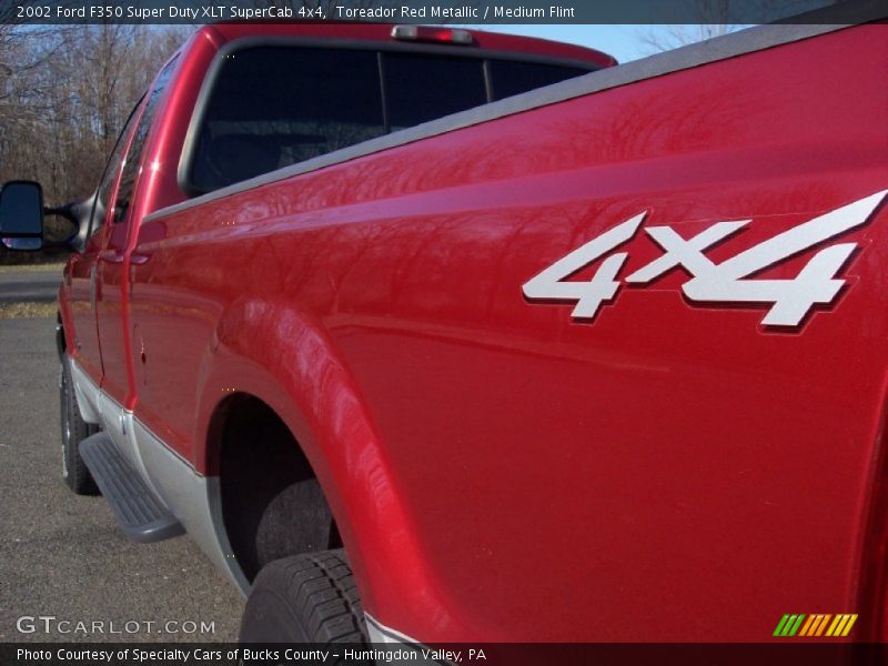 Toreador Red Metallic / Medium Flint 2002 Ford F350 Super Duty XLT SuperCab 4x4