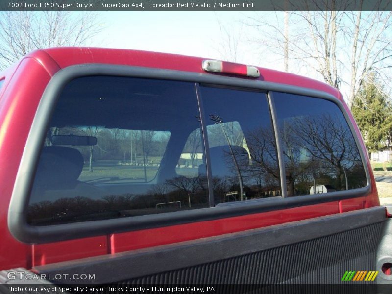 Toreador Red Metallic / Medium Flint 2002 Ford F350 Super Duty XLT SuperCab 4x4
