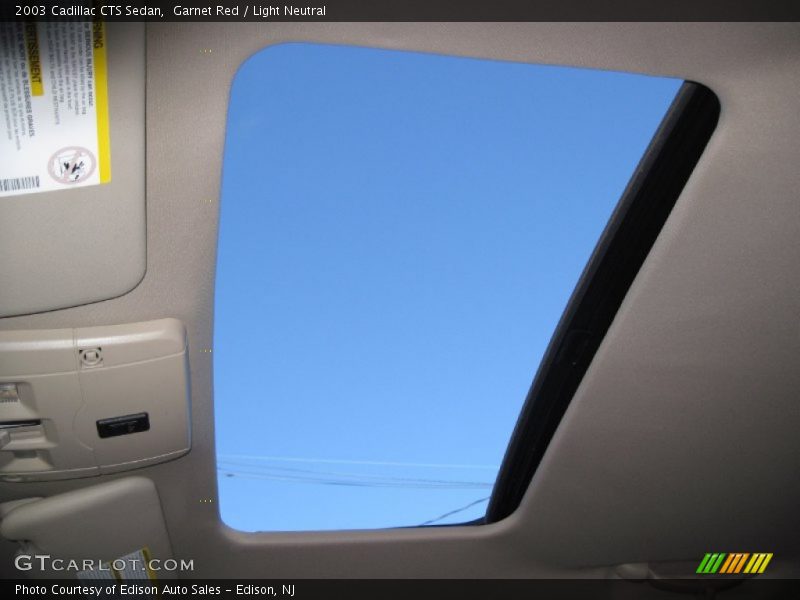 Garnet Red / Light Neutral 2003 Cadillac CTS Sedan