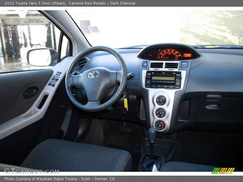 Carmine Red Metallic / Dark Charcoal 2010 Toyota Yaris 5 Door Liftback