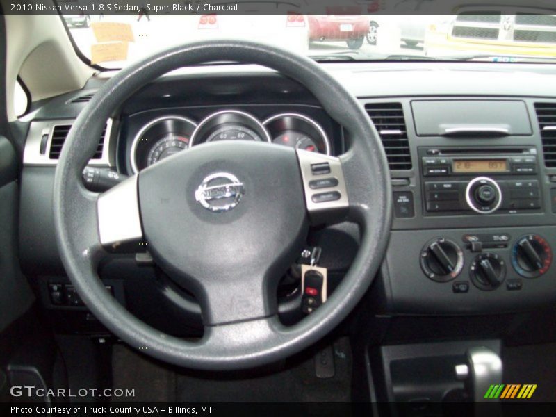 Super Black / Charcoal 2010 Nissan Versa 1.8 S Sedan