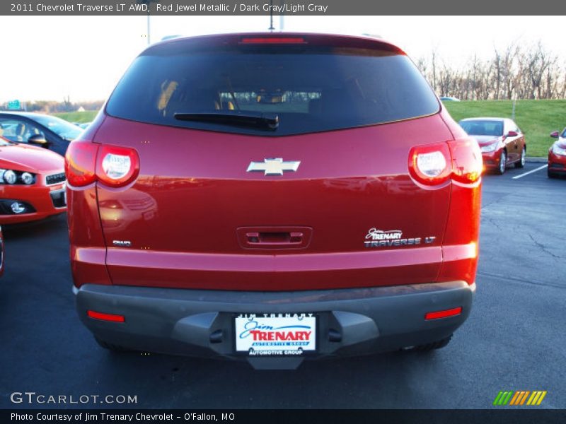 Red Jewel Metallic / Dark Gray/Light Gray 2011 Chevrolet Traverse LT AWD