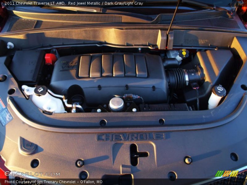 Red Jewel Metallic / Dark Gray/Light Gray 2011 Chevrolet Traverse LT AWD