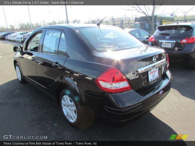 Super Black / Charcoal 2011 Nissan Versa 1.8 S Sedan