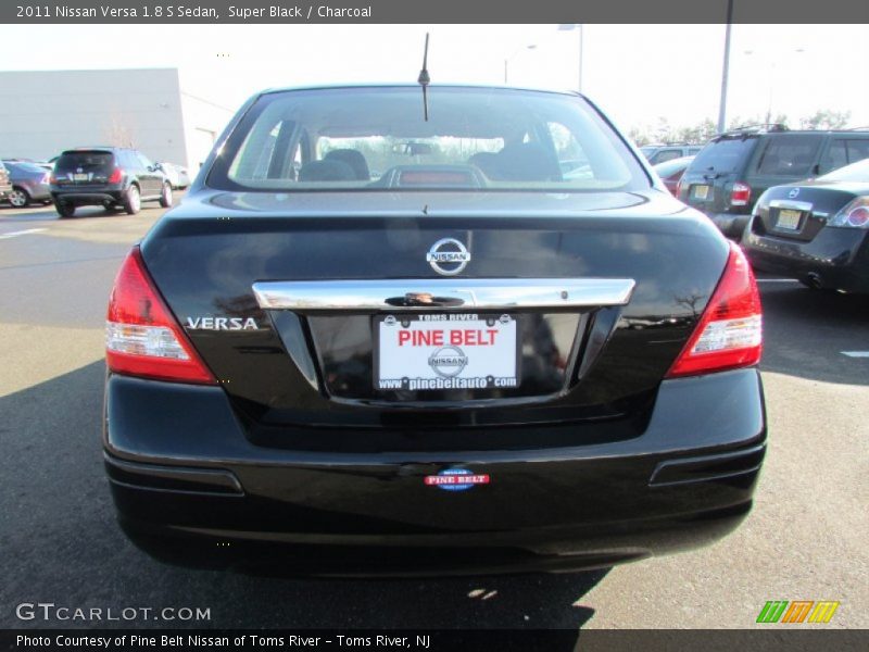 Super Black / Charcoal 2011 Nissan Versa 1.8 S Sedan