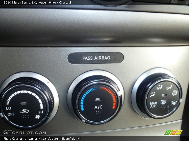 Aspen White / Charcoal 2010 Nissan Sentra 2.0