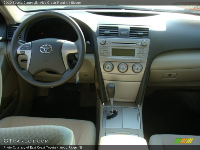 Aloe Green Metallic / Bisque 2010 Toyota Camry LE