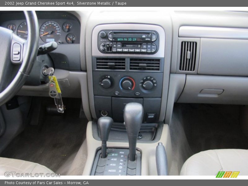 Silverstone Metallic / Taupe 2002 Jeep Grand Cherokee Sport 4x4