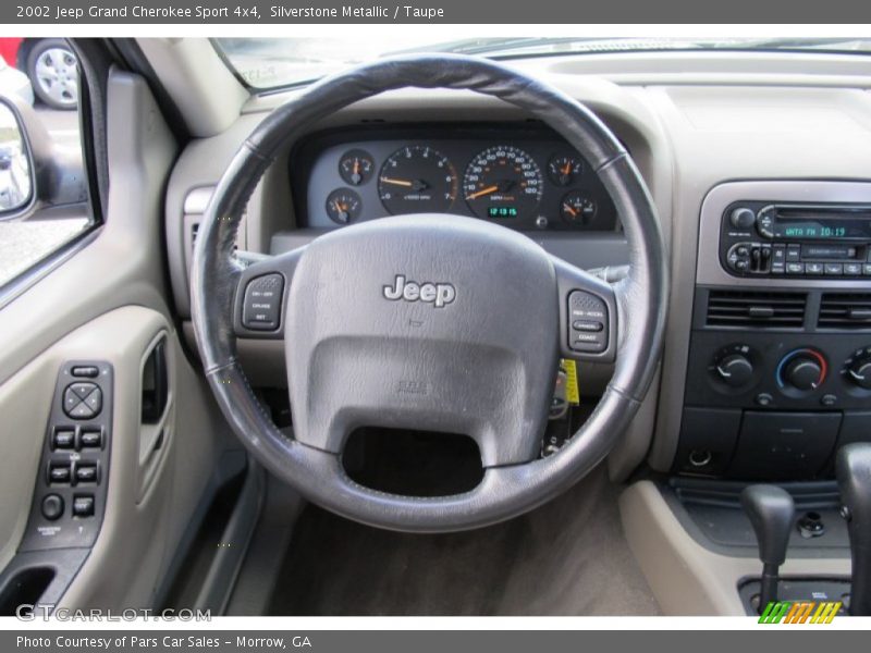 Silverstone Metallic / Taupe 2002 Jeep Grand Cherokee Sport 4x4